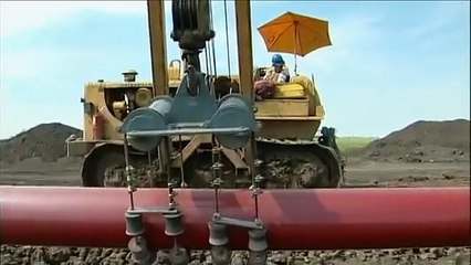 Mighty Machines Laying Down the Pipeline