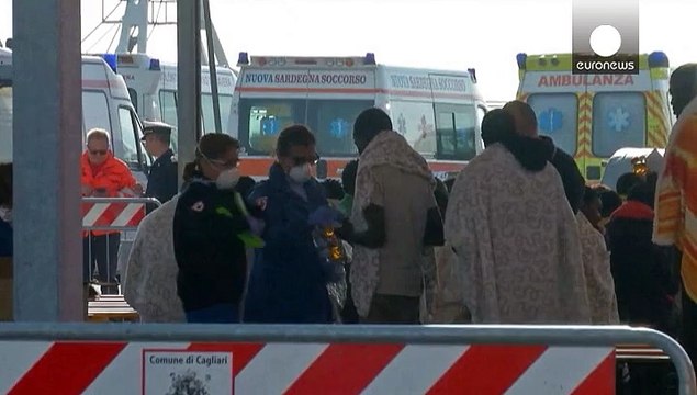 Hundreds of rescued migrants and refugees arrive in Cagliari
