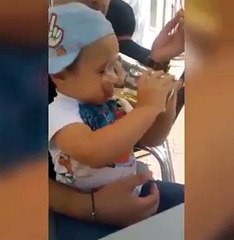 Shocking video shows child forced to drink beer and smoke