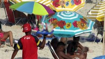 Rekordverdächtige Hitze in Rio treibt Menschen an den Strand