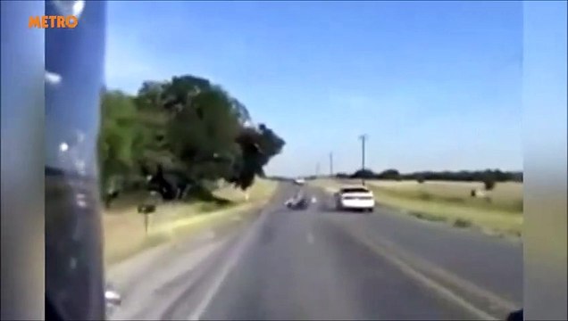 Did this driver deliberately knock over an overtaking motorcyclist?