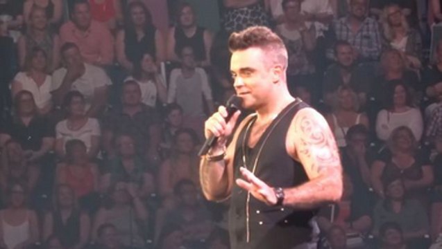 Robbie Williams Gets Accidentally Creepy With A 15 Year Old
