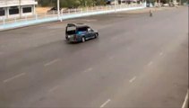Speeding car tries to switch lanes without indicating