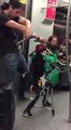 Skeleton puppet does Air Guitar in Subway over guns n' roses