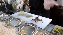 Cutting squid from alive to sashimi at Hakodate Fish Market