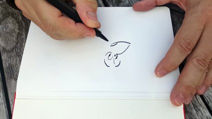 Didier Conrad dessine un personnage de "Astérix"