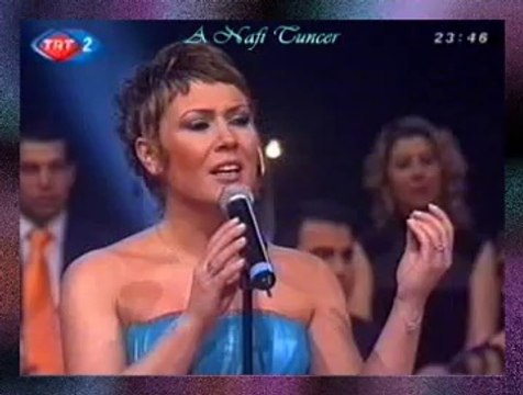 Belgin EROL GÜNDOĞDU-Bilmem Niye Bir Bûseni Sen Çok Görüyorsun