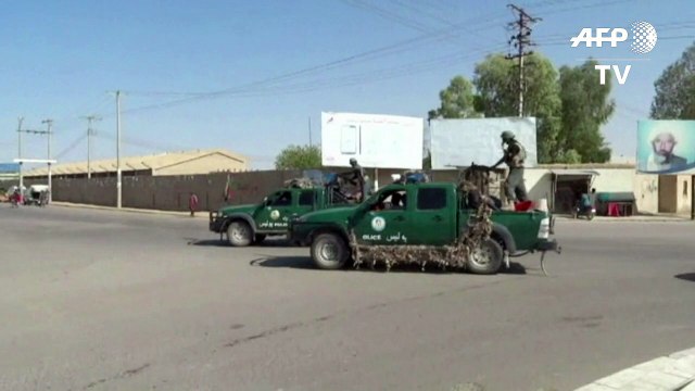 Civilians flee as clashes erupt in southern Afghan city