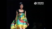 Model almost falls during Qi Gang Spring/Summer 2012 fashion show