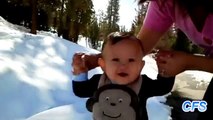 Children in the snow for the first time. Funny children winter