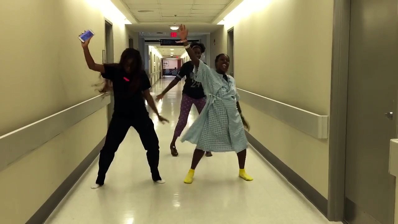 Mommy dancing baby down between contractions