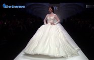 Model in wedding dress falls down during Shanghai Fashion Week 2015