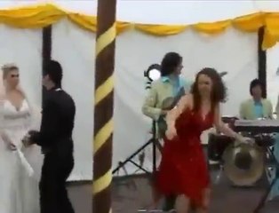 This drunk girl has ruined the wedding party.