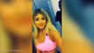 Kylie Jenner wears a hot pink sports bra as she poses for see