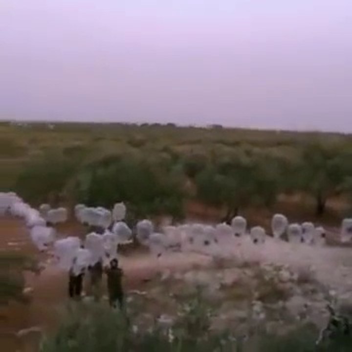 ISIS launches bizarre condom-bombs over the skies of Idlib hoping they will crash into Russian Jet