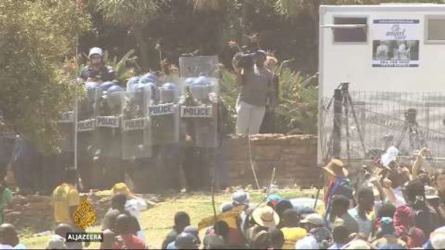 S Africa halts university fee hikes after mass protests