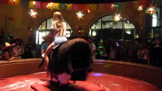 This Cowgirl Turns Mechanical BullRiding Into A Sexy Routine Video