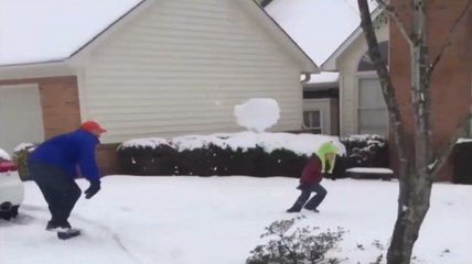 Father Throws Massive SnowBall On Son
