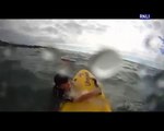 Drowning boy washed out to sea in a riptide gets rescued by a lifeguard