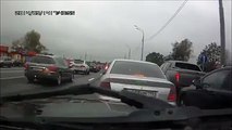 Road raging driver gets a surprise when he confronts someone in traffic