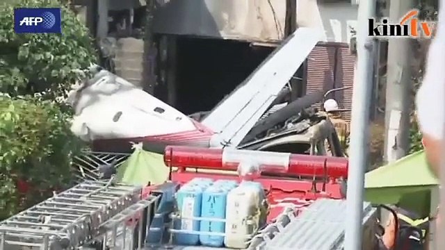 Three dead as small plane crashes into Tokyo suburb