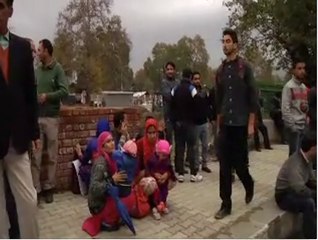 Srinagar India earthquake scared People sitting on road