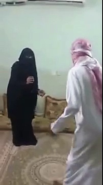 Muslim men beating a muslim woman