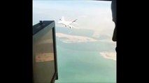 Tiny plane about to crash on big Emirates airplane... Scary!!!