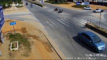 Scooter bursts into flames after crashing into car