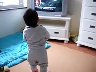 Little Kid Listening to Quran Attentively