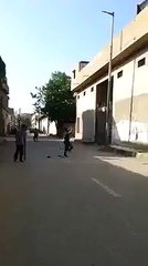 man cheer leaders at street..very funny