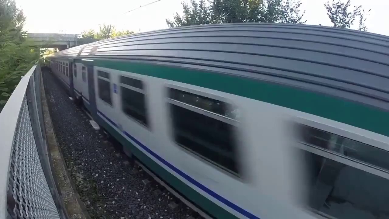 TRAIN PASSING OVER A CRAZY GUY!