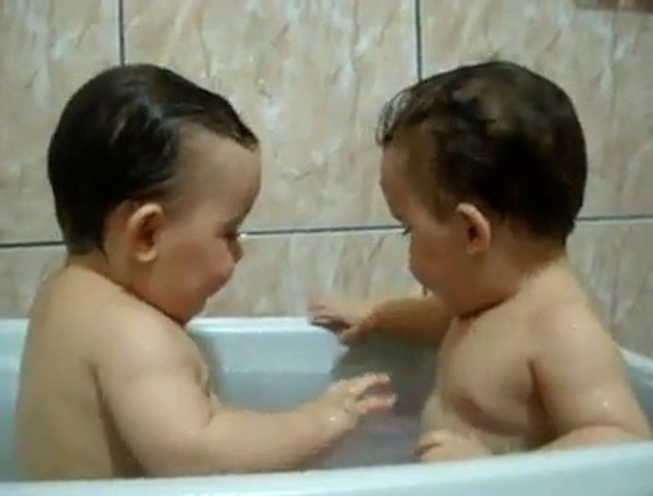Twins Brothers Enjoying Bath Time
