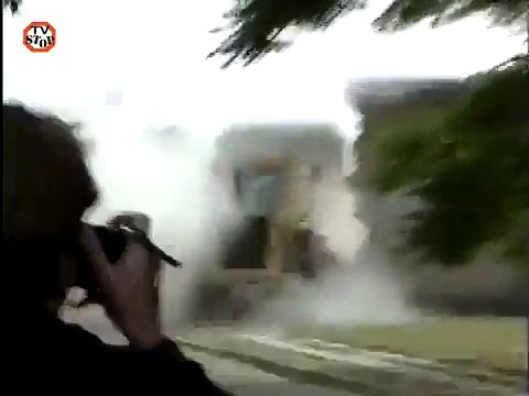 Prisoners Escape A Prison Using A Bulldozer
