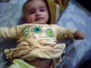 A baby dancing on bed trying to move some where small baby - Sweet Babies