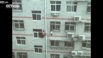 LiveLeak Man with mop saves girl hanging off window