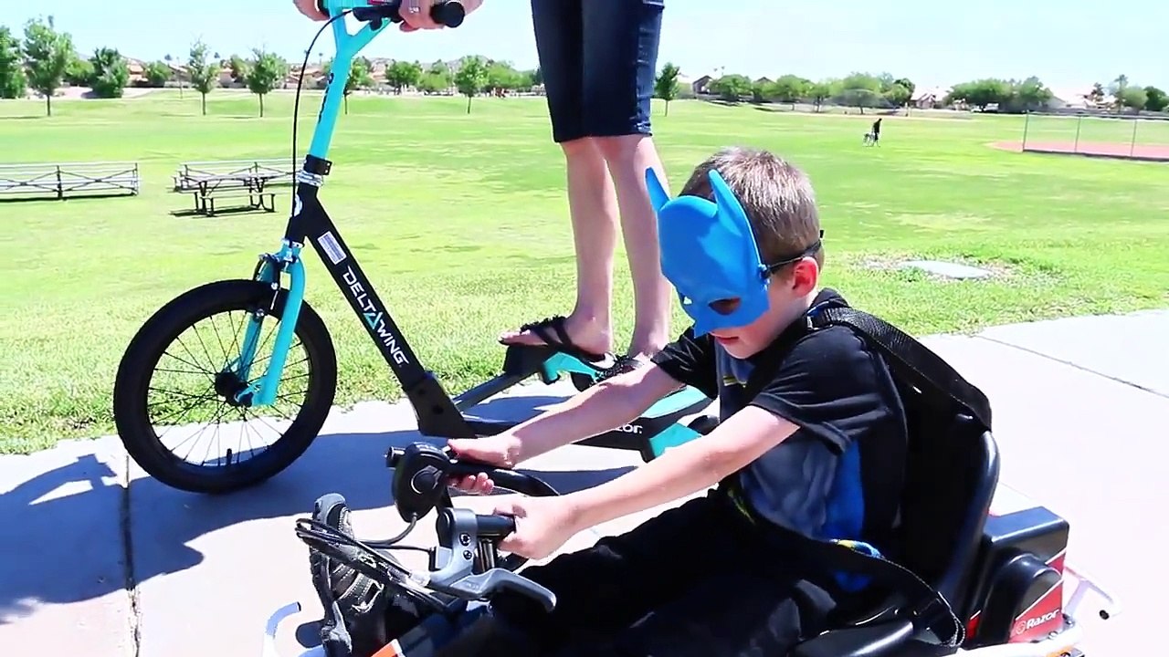 Razor Go-Cart with Little Batman vs Razor Scooter vs Power Wheels with Sandra by ToysReviewToys