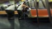 Guy gives some of his Clothes to Homeless Man on NYC Subway