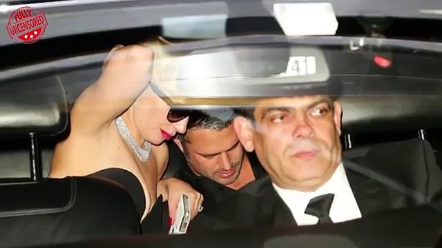Lady Gaga Caught Smooching While Flashing Ample Cleavage