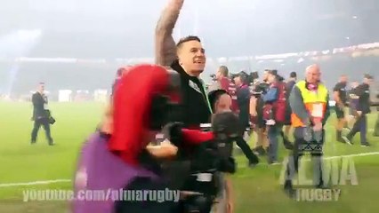 Sonny Bill Williams gives his World Champion medal to a young fan