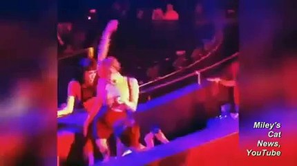 Miley Cyrus is Caught Smooching Sexy Brunette at Britney concert