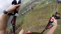 Insane para glider threads the needle between two high rises