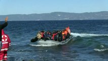 Shivering migrants arrive in Lesbos