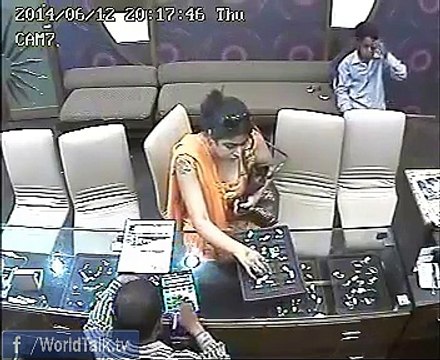 Female thief caught on CCTV camera stealing jewellery