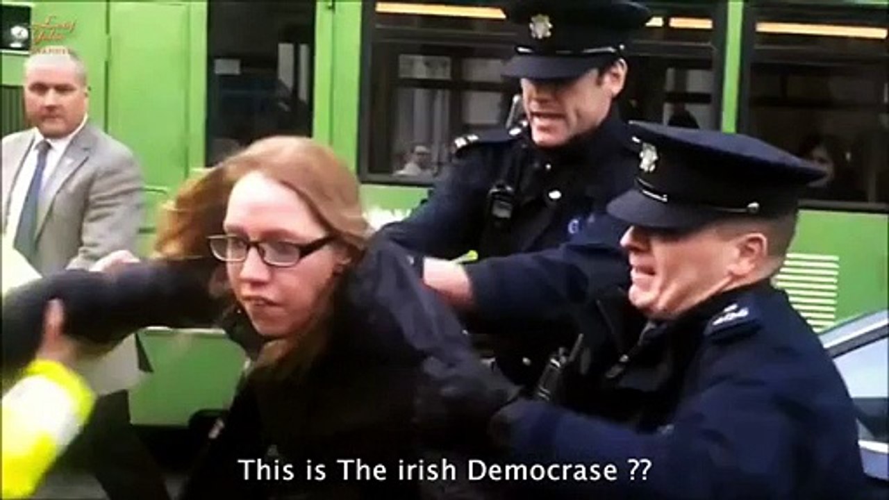 Irish Gardai brutality , Gardai throw a woman on the ground