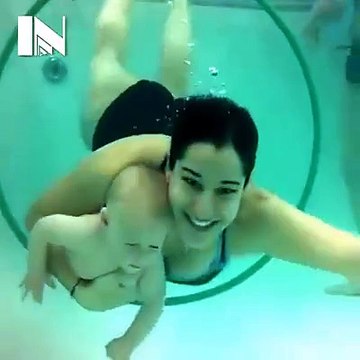 Babies having swimming lessons - an underwater view!
