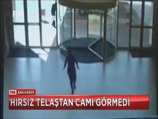 Karı koca hırsızı döner kapı böyle çarptı