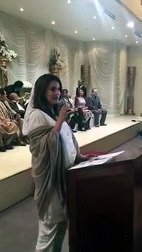 Reham Khan addressing a conference in Manchester UK