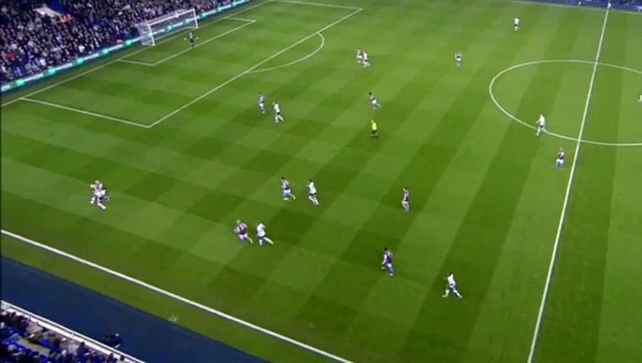 Referee Mike Dean celebrating Tottenham goal