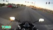 Tender-hearted biker stops traffic at busy intersection to rescue kitten